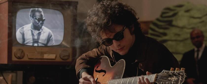 Gibson Partners with Searchlight Pictures for ‘A Complete Unknown’ Starring Timothée Chalamet as Bob Dylan, film still shot